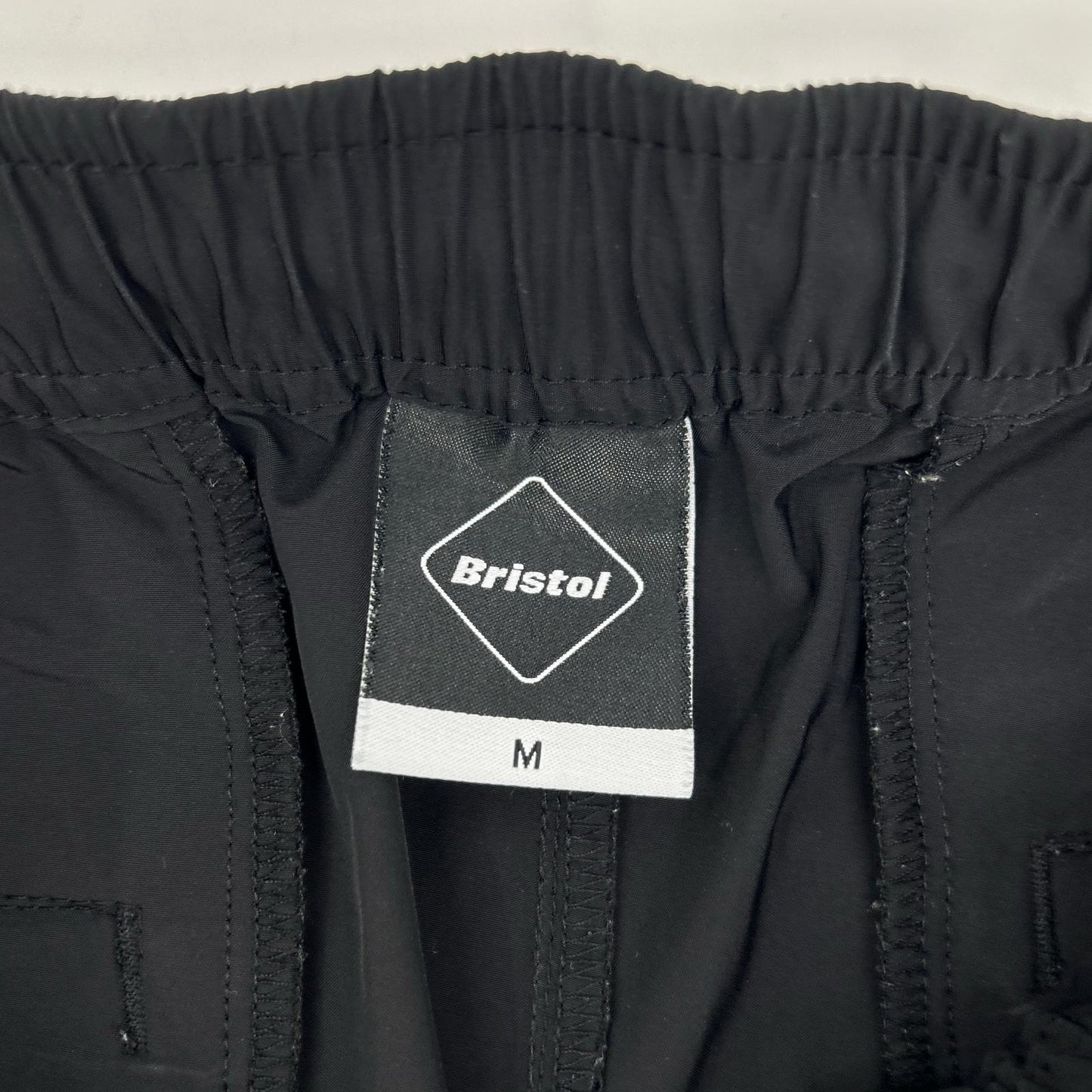 F.C.Real Bristol エフシーリアルブリストル ×SOPH. FCRB-222011 ブラック×ホワイト ナイロン SIDE LINE TRAINING PANTS ボトムス
