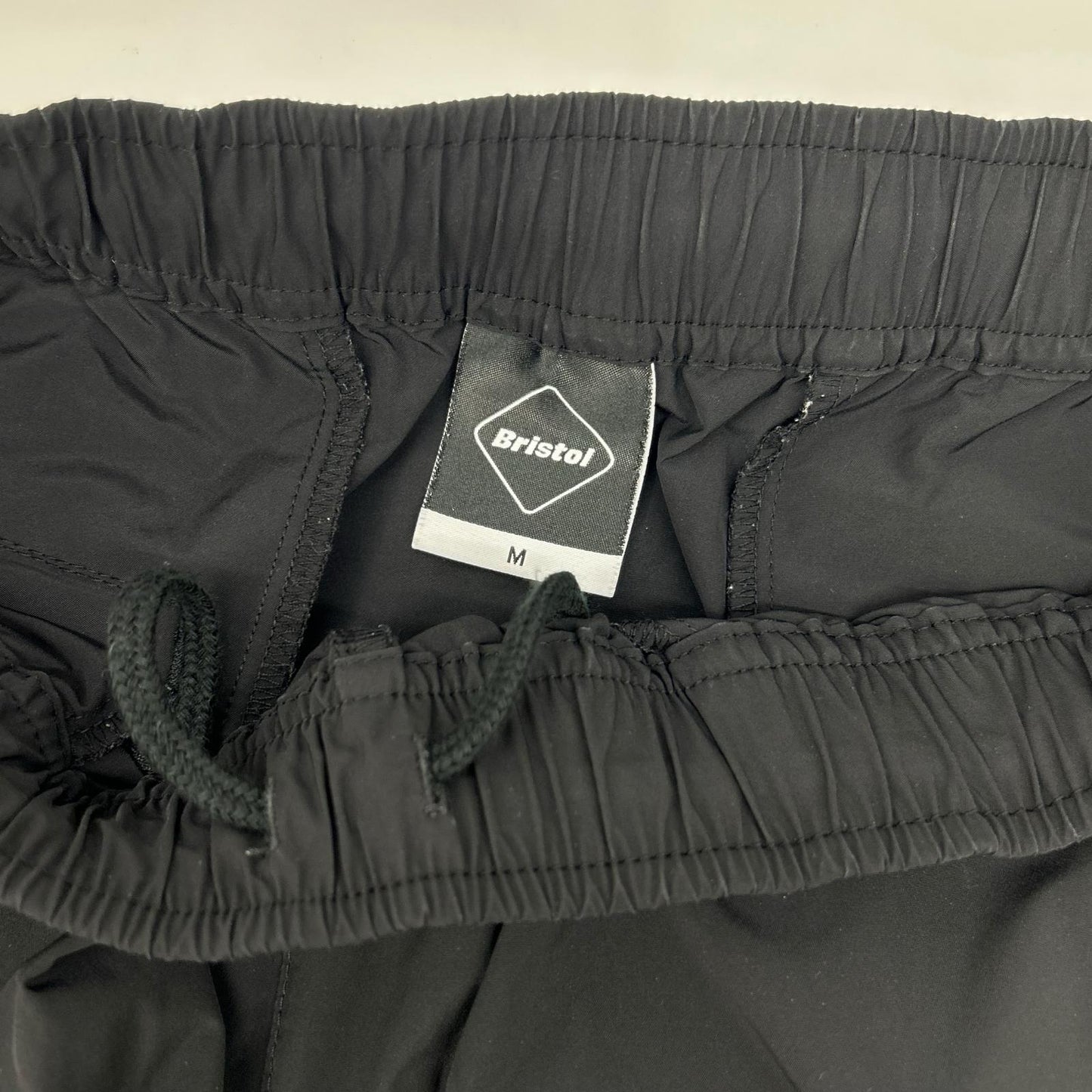 F.C.Real Bristol エフシーリアルブリストル ×SOPH. FCRB-222011 ブラック×ホワイト ナイロン SIDE LINE TRAINING PANTS ボトムス