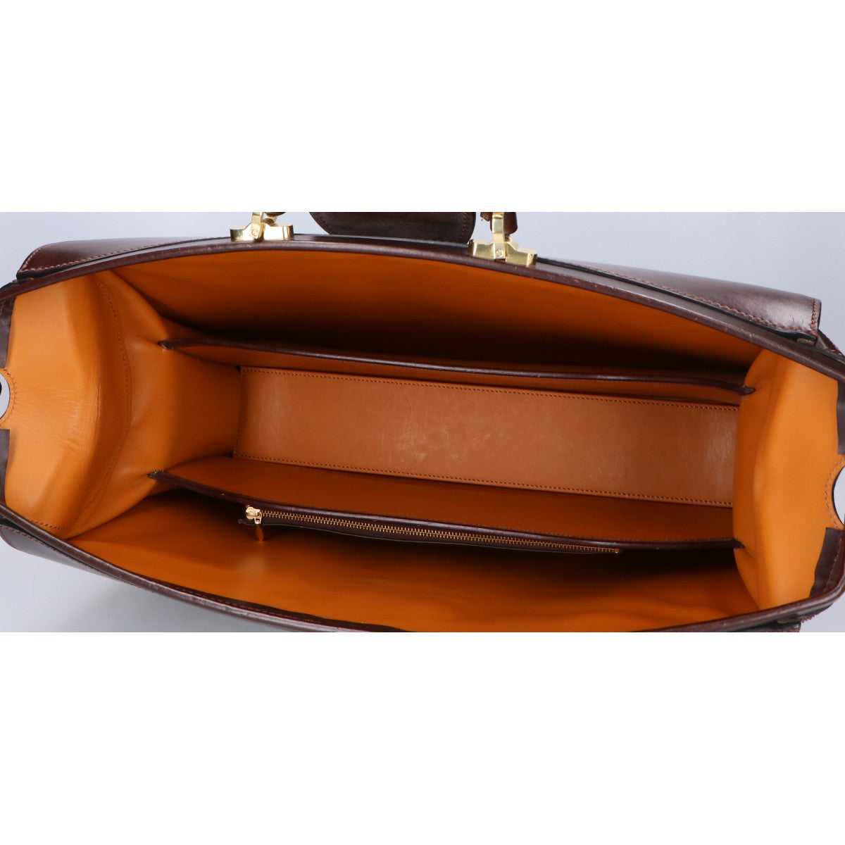 MANSOU Bridle leather three-gusset Dalles business bag/briefcase
