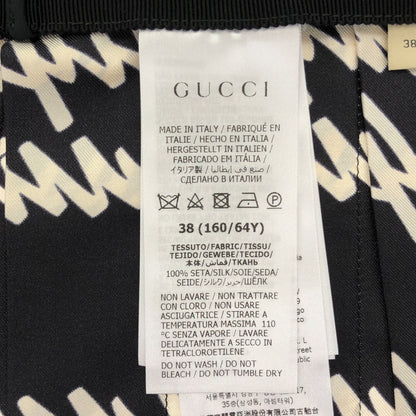 GUCCI グッチ 751307 23AW ブラック シルク100 Script Print 総柄プリーツロングスカート ボトムス
