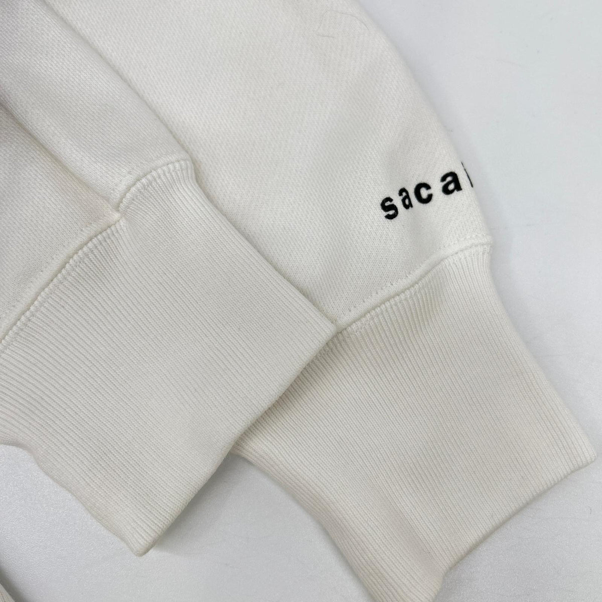 sacai 【×KAWS】2021 21-0286S White flock print hoodie Tops