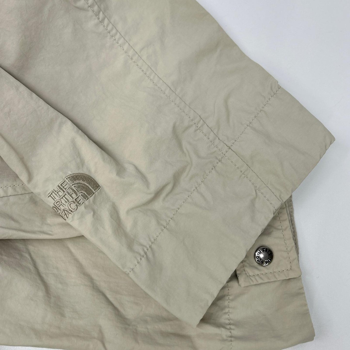 THE NORTH FACE NPW22360 Fossil Ivory Rollpack Journeys Coat