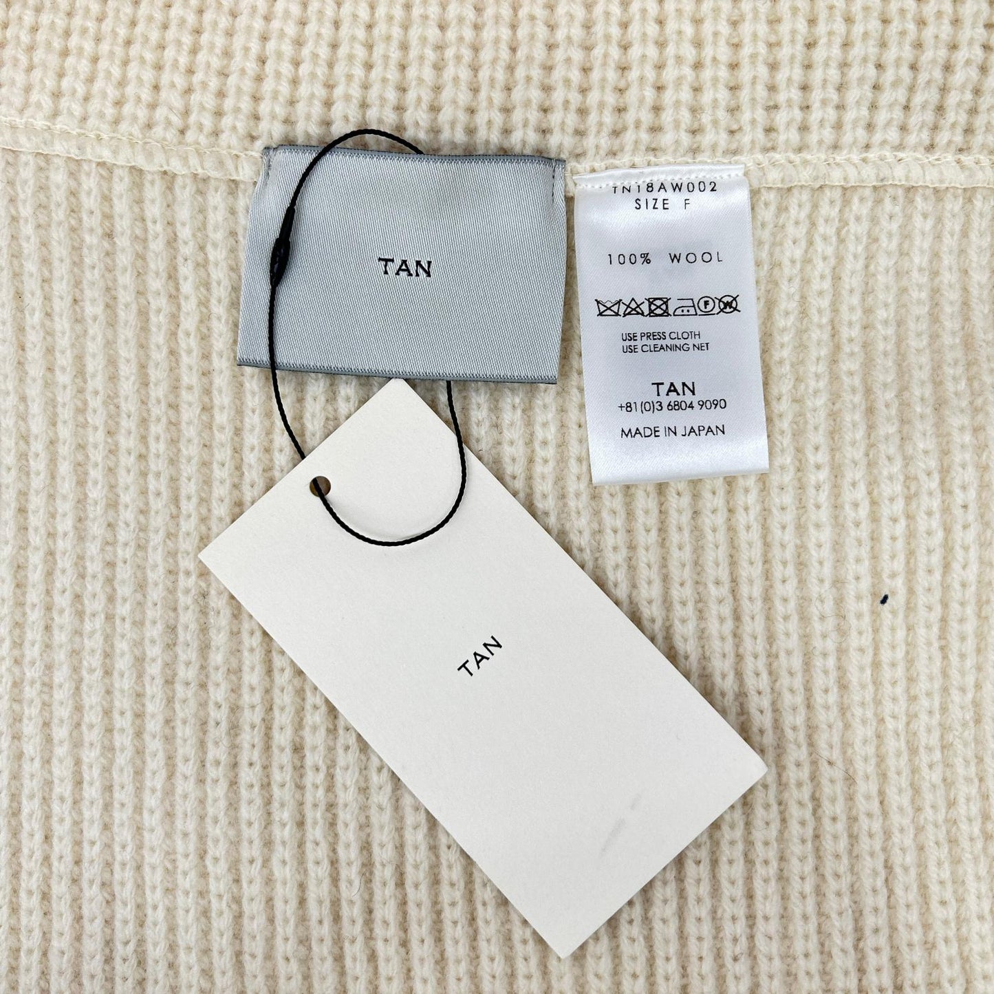 TAN タン TN18AW002 アイボリー ウール100 ラップエプロン ニットスカート スカート