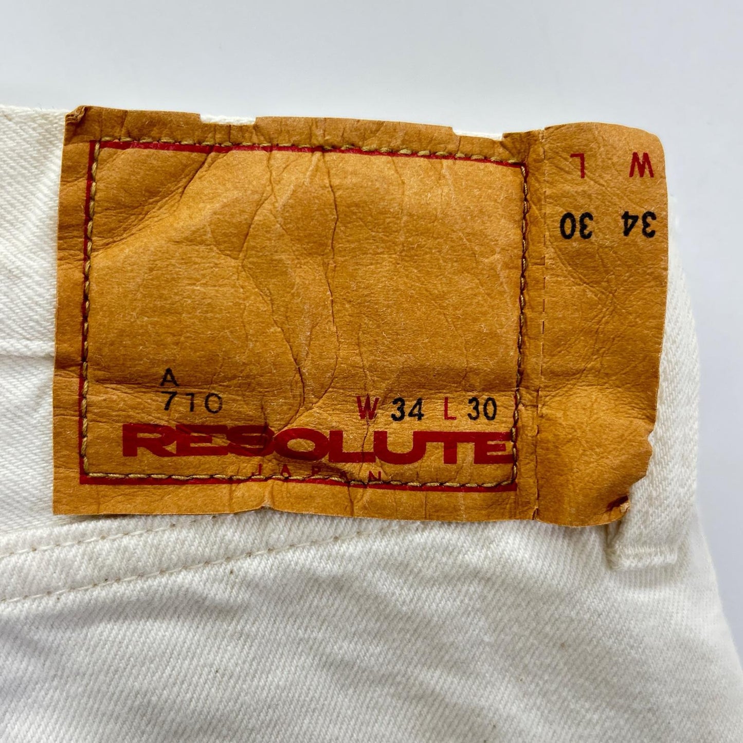 RESOLUTE リゾルト A710 ホワイト 5th Anniversary ボタンフライ テーパードパンツ ボトムス