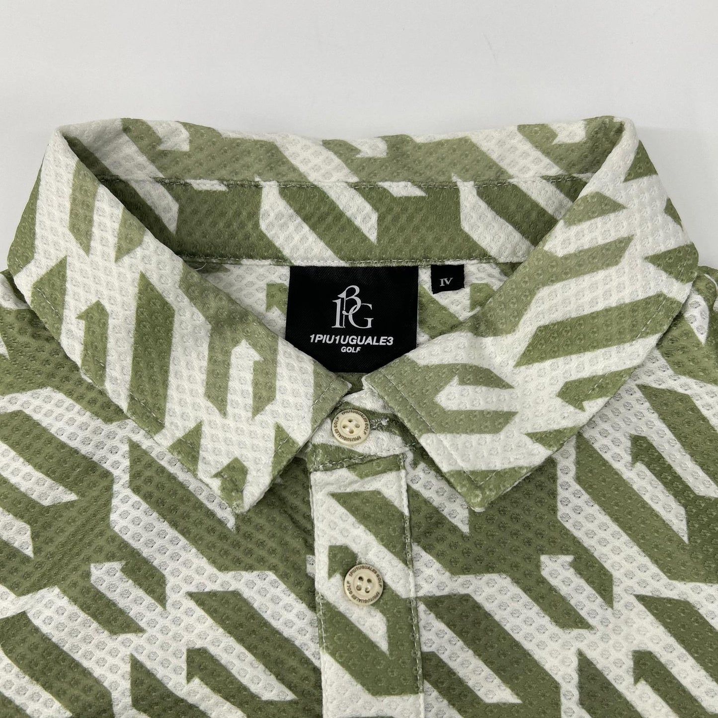 1piu1uguale3 ウノピゥウノウグァーレトレ 【GOLF】【×戸賀敬城】GRT119-PRY089 カーキ HOUNDTOOTH S/S POLO TOGA LIMITED MODEL 総柄メッシュ半袖ポロシャツ トップス