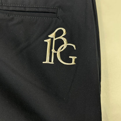 1piu1uguale3 ウノピゥウノウグァーレトレ 【GOLF】GSP071-POE478 ブラック BASIC LONG PANTS ナイロンスラックスパンツ ボトムス