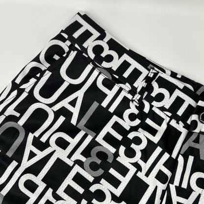 1piu1uguale3 ウノピゥウノウグァーレトレ 【GOLF】GRP104-POE398 ブラック SHORTS FULL MIX LOGO ロゴ総柄ショートパンツ ボトムス