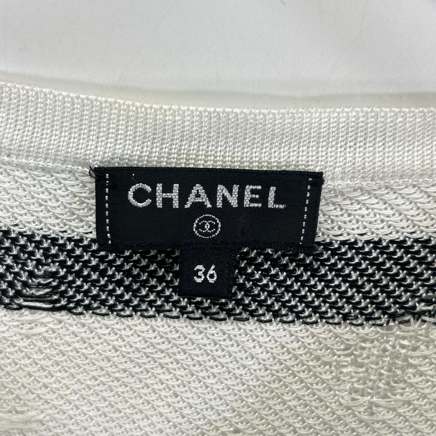 CHANEL Chanel P56171K07378 17SS white and navy Coco Mark button distressed camellia striped V-neck knit top