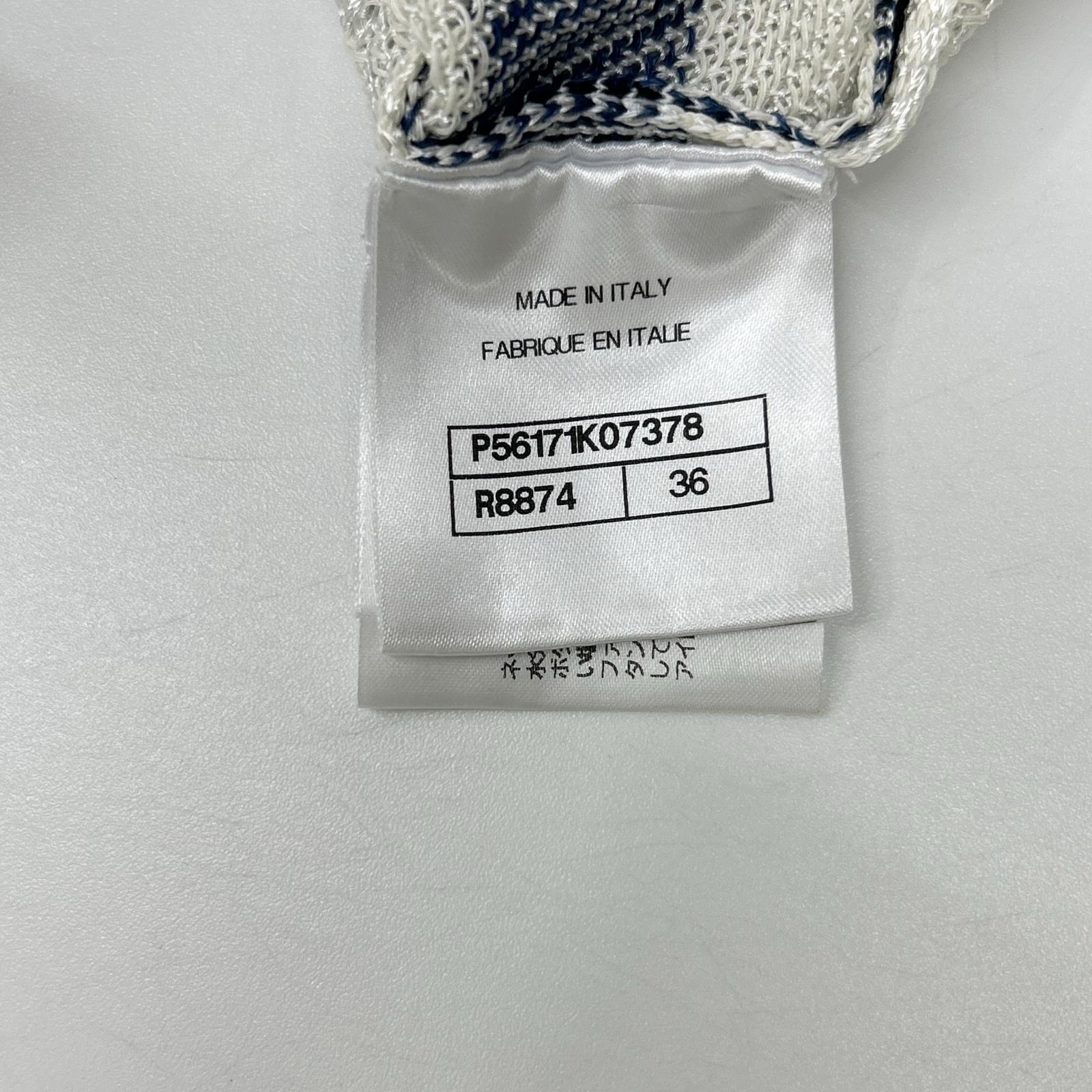 CHANEL Chanel P56171K07378 17SS white and navy Coco Mark button distressed camellia striped V-neck knit top