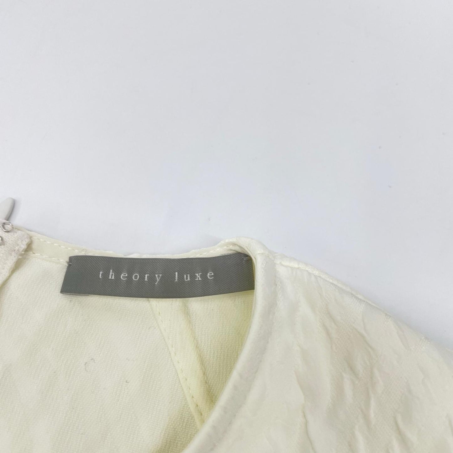 theory luxe セオリーリュクス 25SS ホワイト バックジップ ウォッシャブルペプラムブラウス トップス