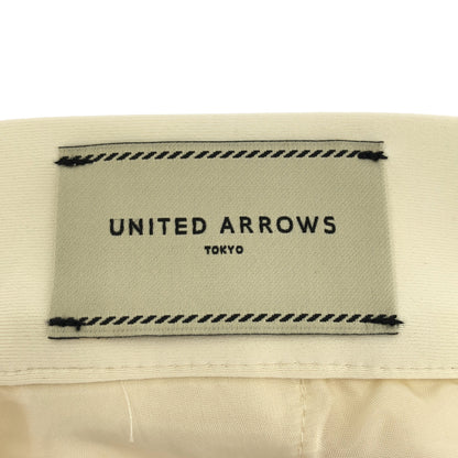 UNITED ARROWS ユナイテッドアローズ オフホワイト SPONGY タック テーパードパンツ ボトムス