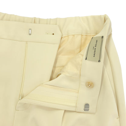 UNITED ARROWS ユナイテッドアローズ オフホワイト SPONGY タック テーパードパンツ ボトムス