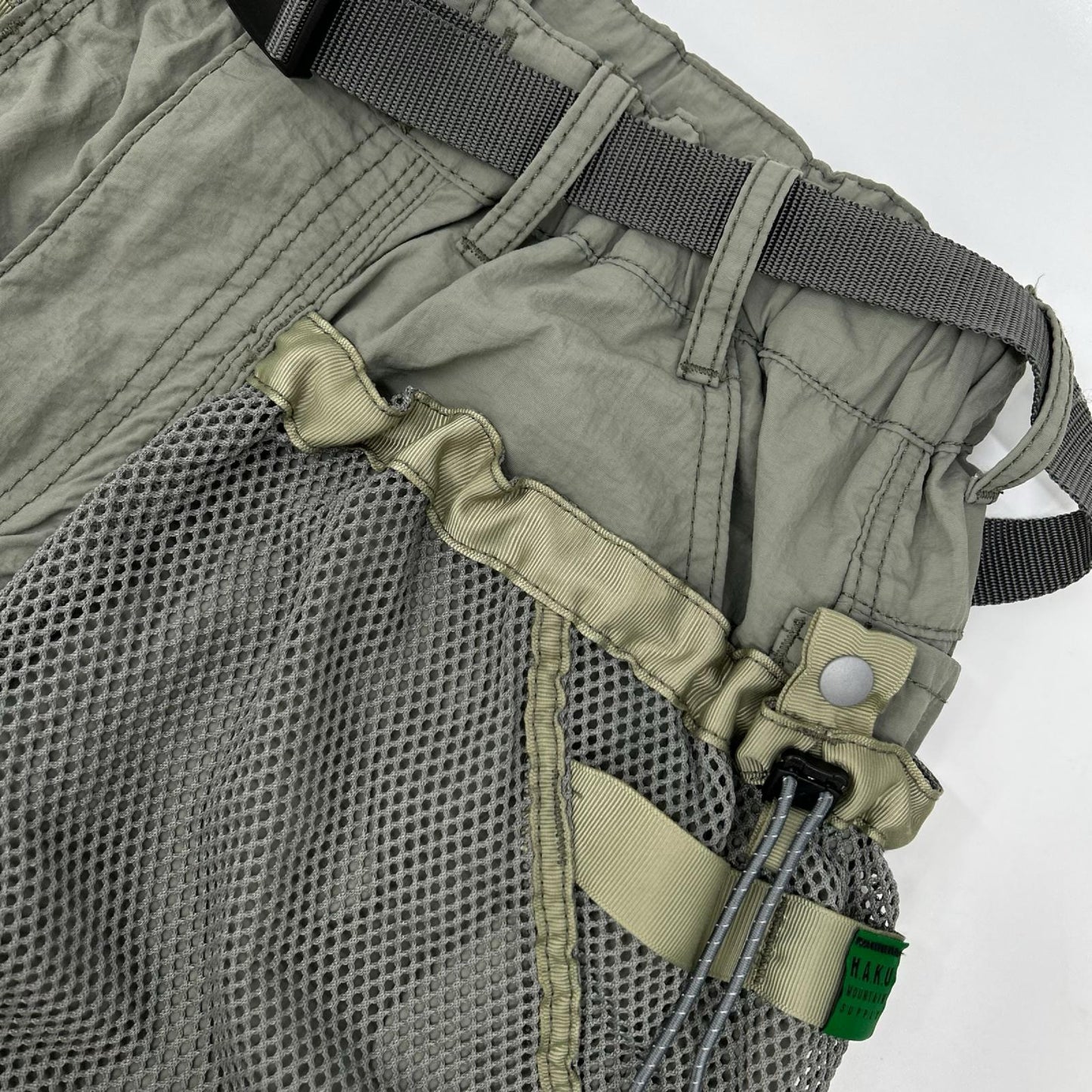 NANGA ナンガ 【×H.A.K.U】カーキ メッシュポケット BIKU TROUSERS ボトムス