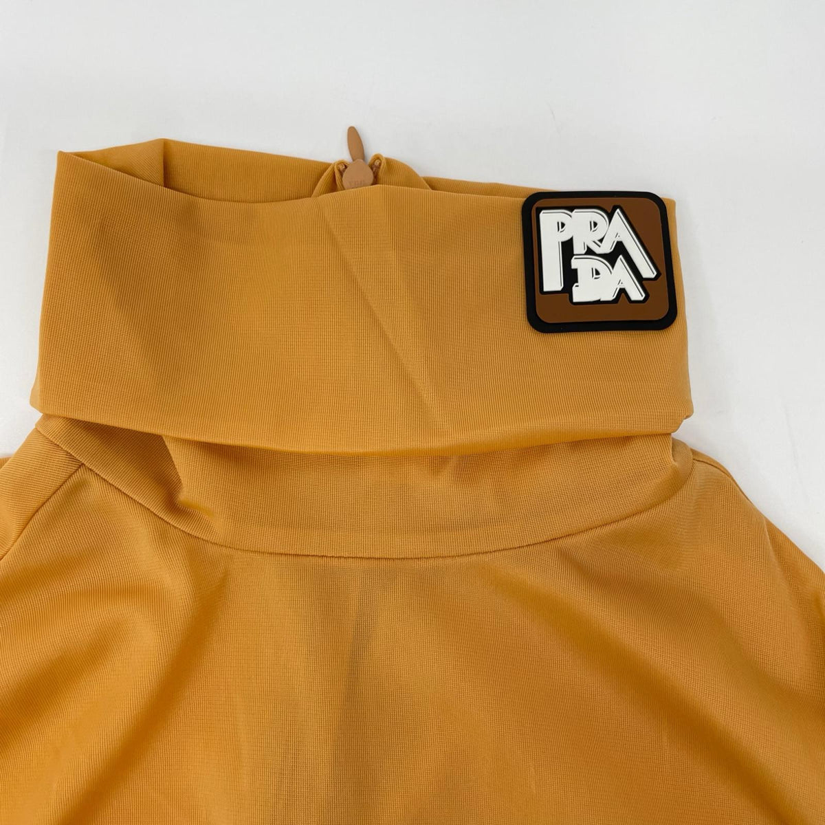 PRADA プラダ UJL051 ベージュ ラバーパッチ シースルージャージータートルネックカットソー トップス