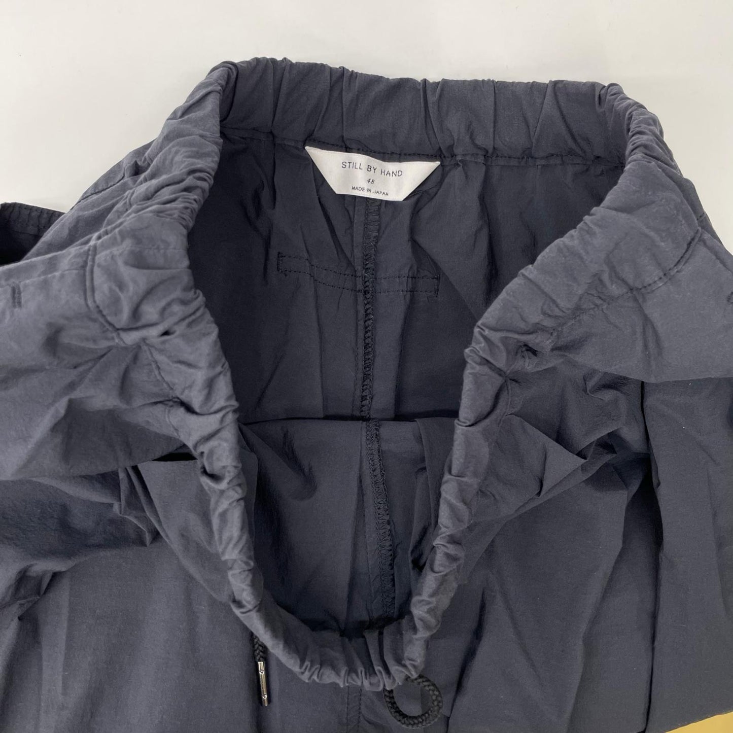 STILL BY HAND スティルバイハンド チャコール コットン×ナイロン ウエストゴム 裾ジップ トレーニングパンツ ボトムス