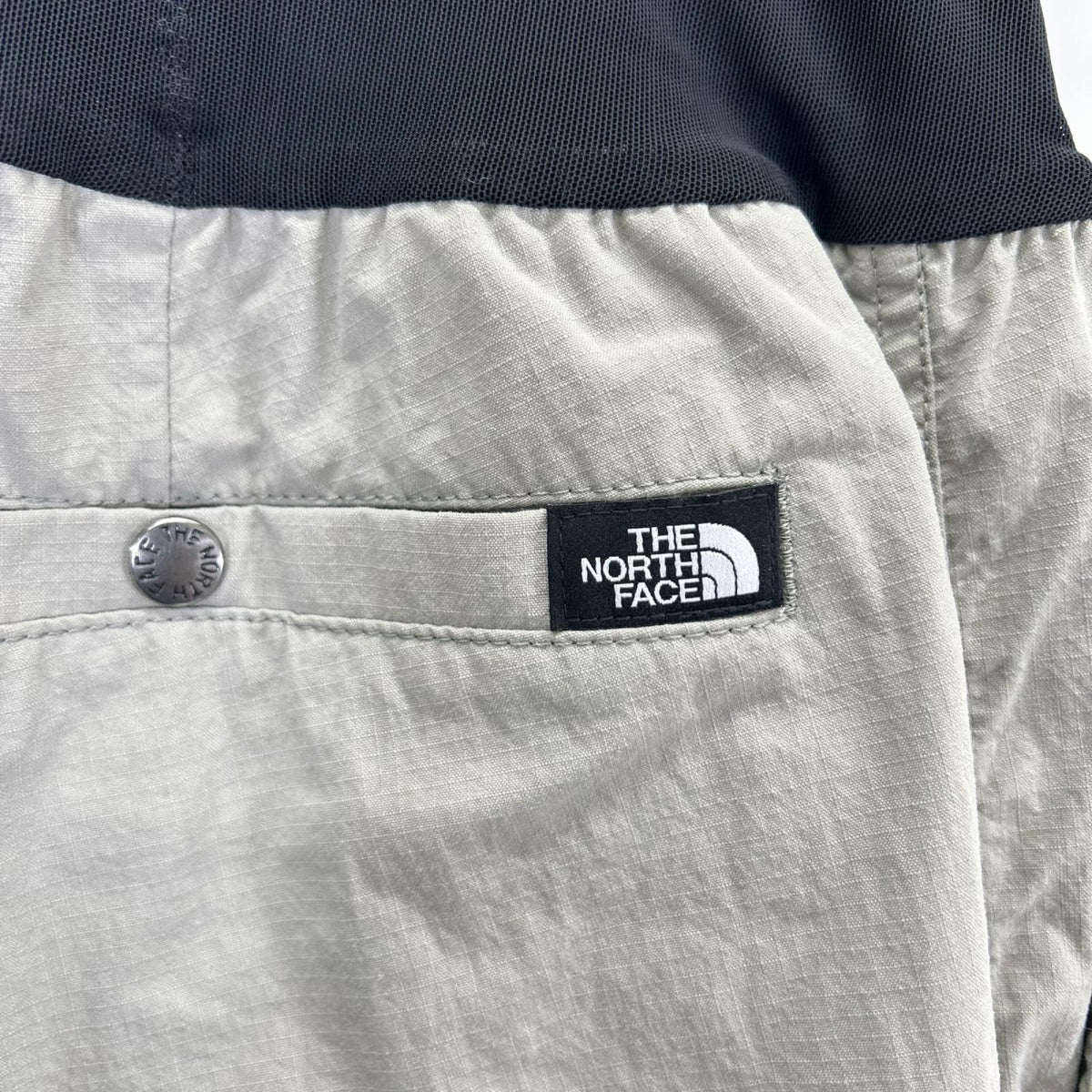 THE NORTH FACE ノースフェイス 25年製 NB82561 ベージュ×ブラック ジップフライ エンライドパンツ ボトムス