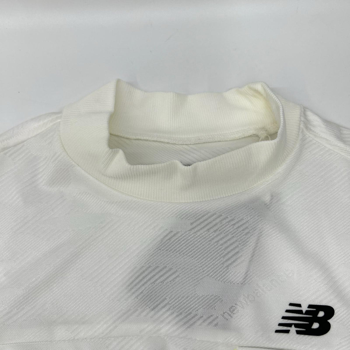 NEW BALANCE ニューバランス 012-4166006 24SS ホワイト メンズ ドライビングレインカモ柄 半袖 モックネック ゴルフシャツ トップス