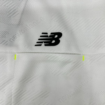 NEW BALANCE ニューバランス 012-4166006 24SS ホワイト メンズ ドライビングレインカモ柄 半袖 モックネック ゴルフシャツ トップス