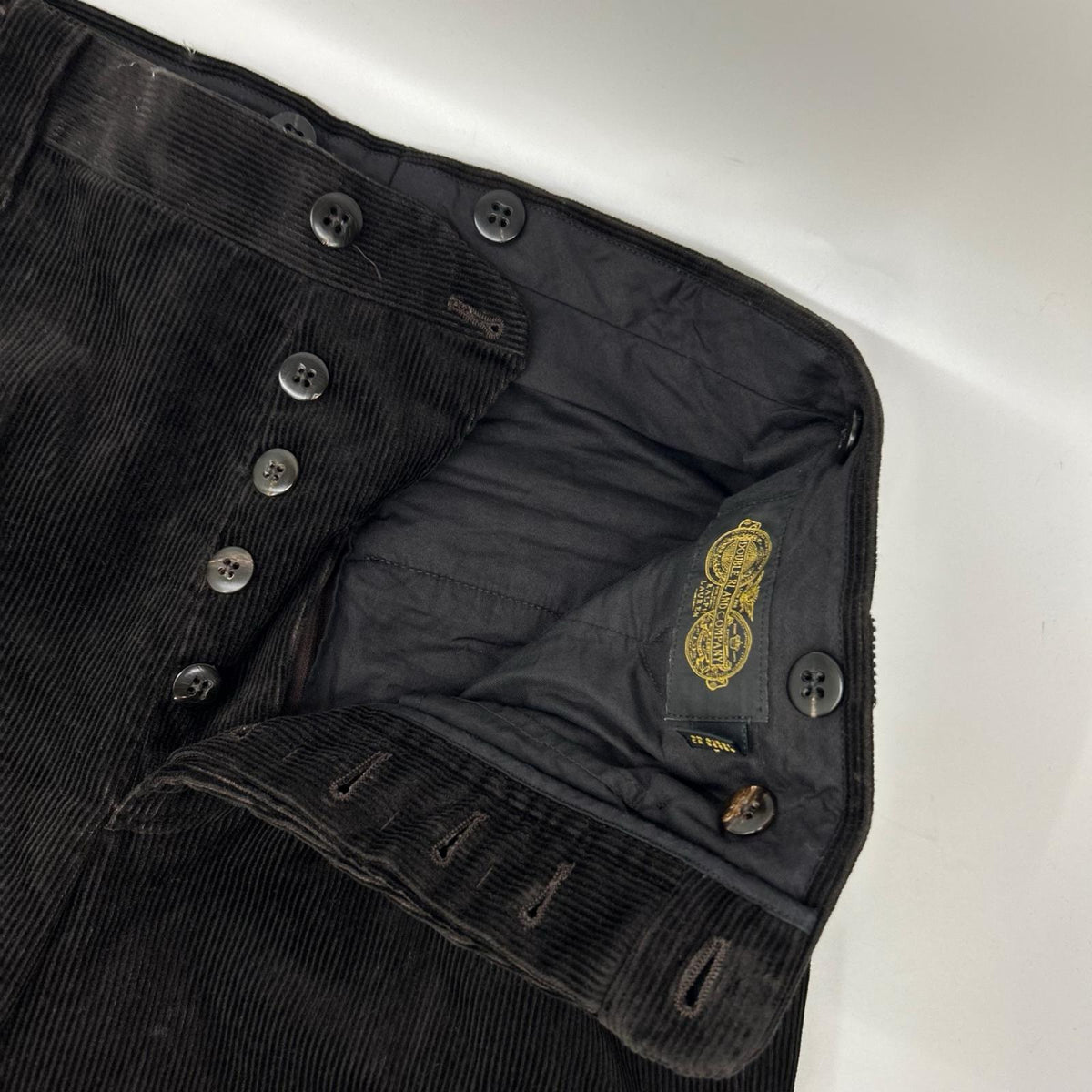 RRL ダブルアールエル 782945548001 イタリア製 ダークブラウン コットン ボタンフライ センタープレス コーデュロイテーパードスラックス ボトムス