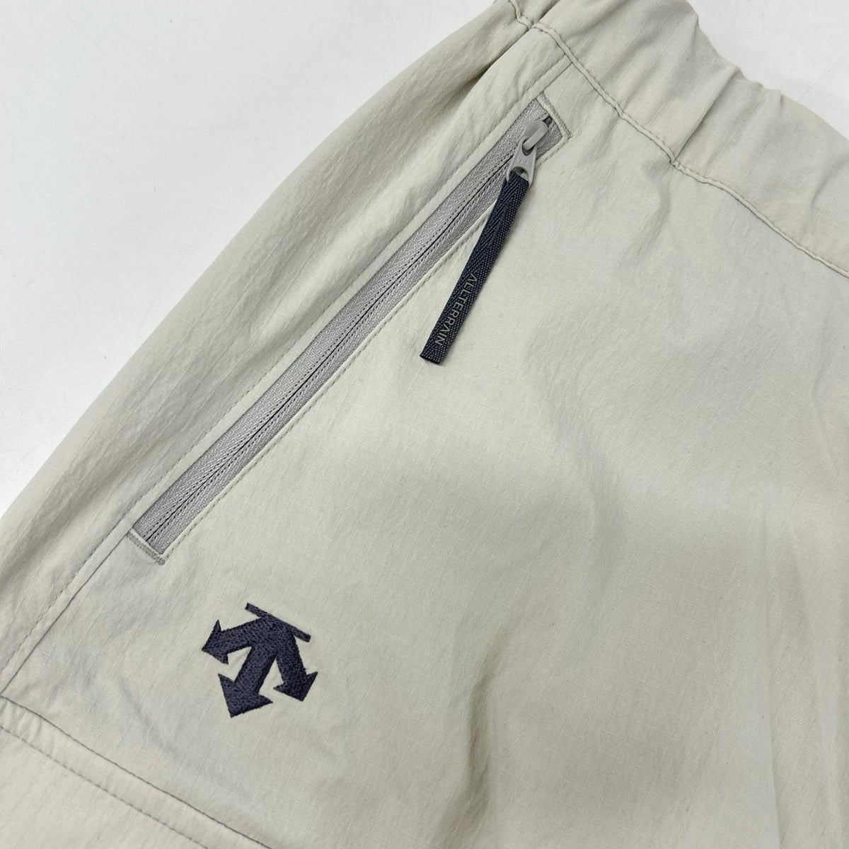 DESCENTE デサント 【ALLTERRAIN】D06SLP06M ライトベージュ コーデュラストレッチリップストップカーゴパンツ ボトムス