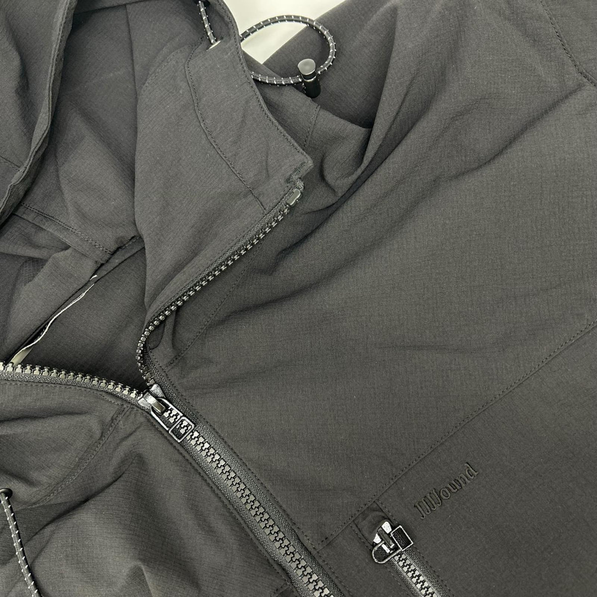 ジョウンド JJJJOUND ブラック リップストップナイロン 刺繍ロゴ ドローコード Trail Jacket/トレイルジャケット ジャケット