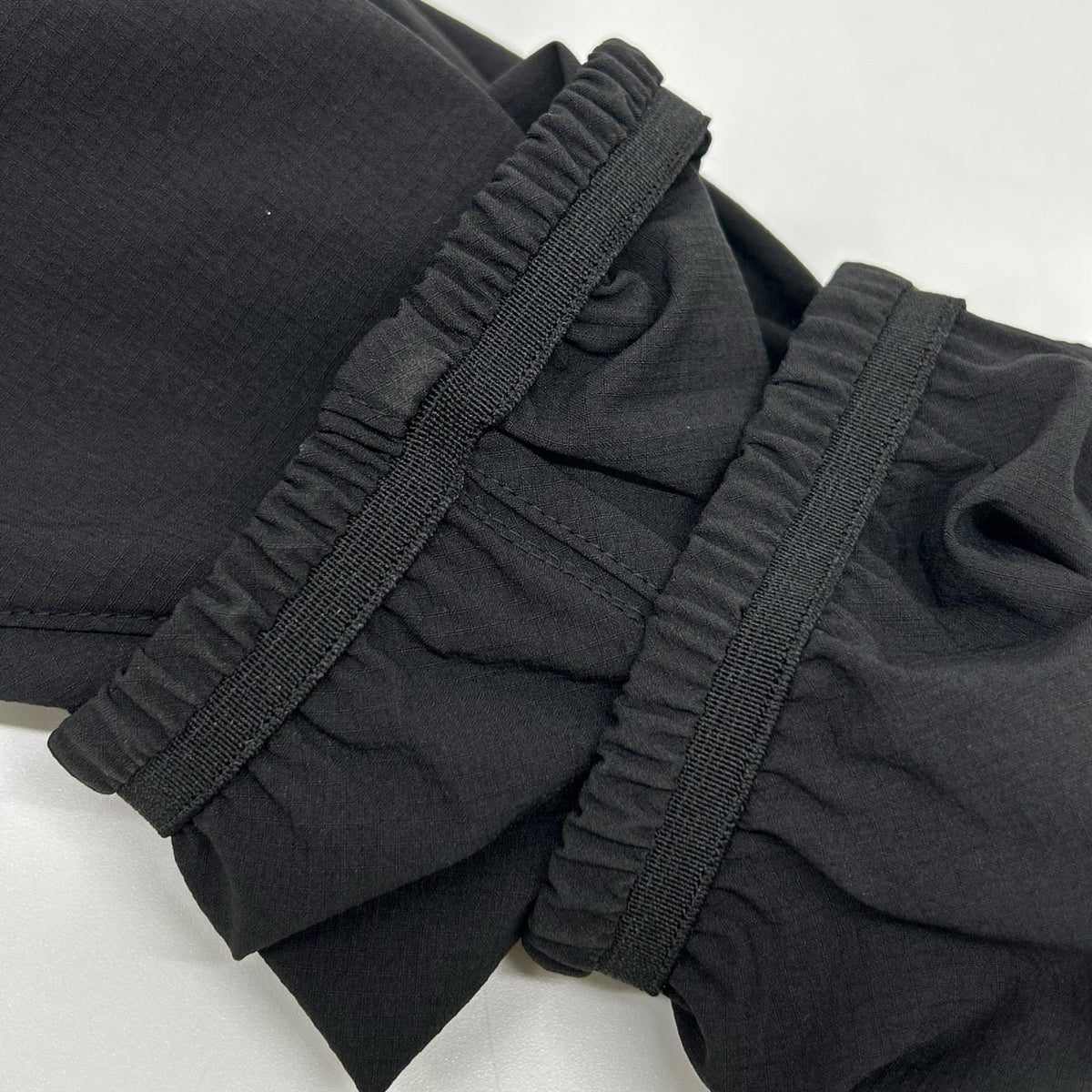 ジョウンド JJJJOUND ブラック リップストップナイロン 刺繍ロゴ ドローコード Trail Jacket/トレイルジャケット ジャケット