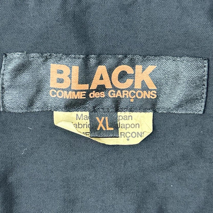 BLACKCOMMEdesGARCONS ブラックコムデギャルソン 26SS 1Q-B004 ブラック エステルスパンブロード 製品後加工シャツ トップス