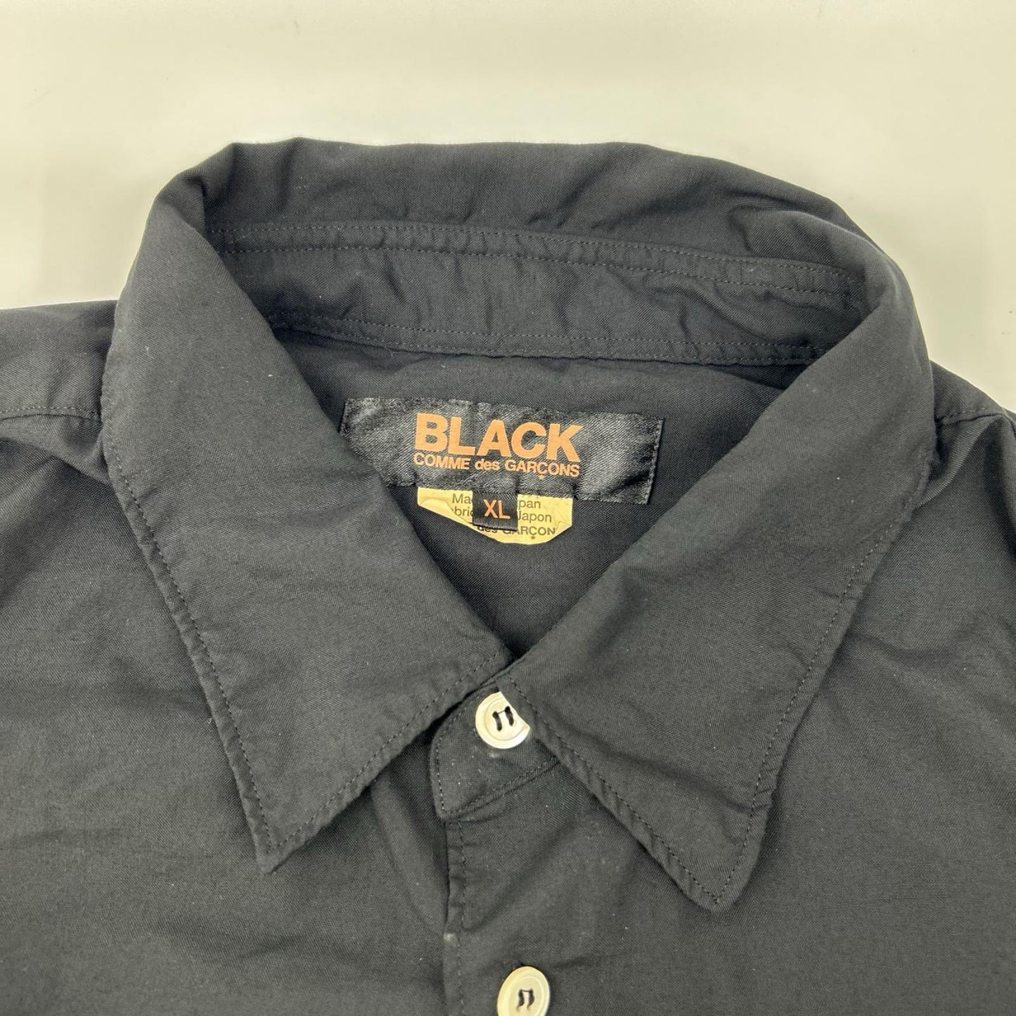 BLACKCOMMEdesGARCONS ブラックコムデギャルソン 26SS 1Q-B004 ブラック エステルスパンブロード 製品後加工シャツ トップス