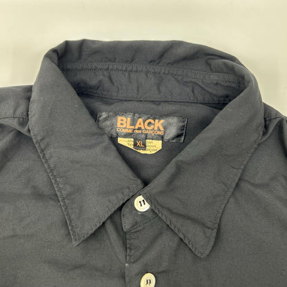 BLACKCOMMEdesGARCONS ブラックコムデギャルソン 26SS 1Q-B004 ブラック エステルスパンブロード 製品後加工シャツ トップス