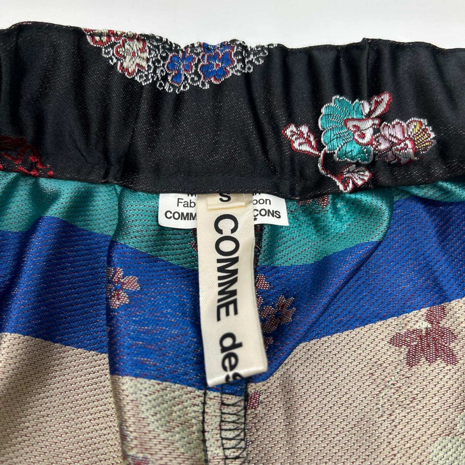 COMMEdesGARCONS コムデギャルソン 25SS GO-P001 ブラック 紋章 総柄 スウェットパンツ ボトムス
