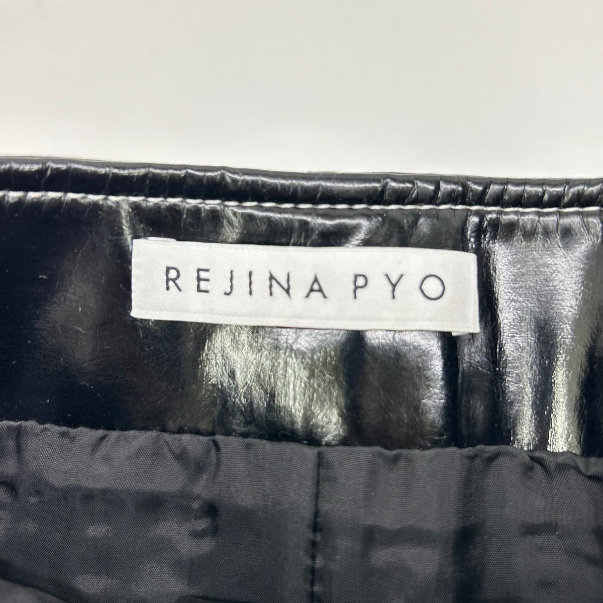 REJINA PYO black patent leather white-stitch slit skirt skirt